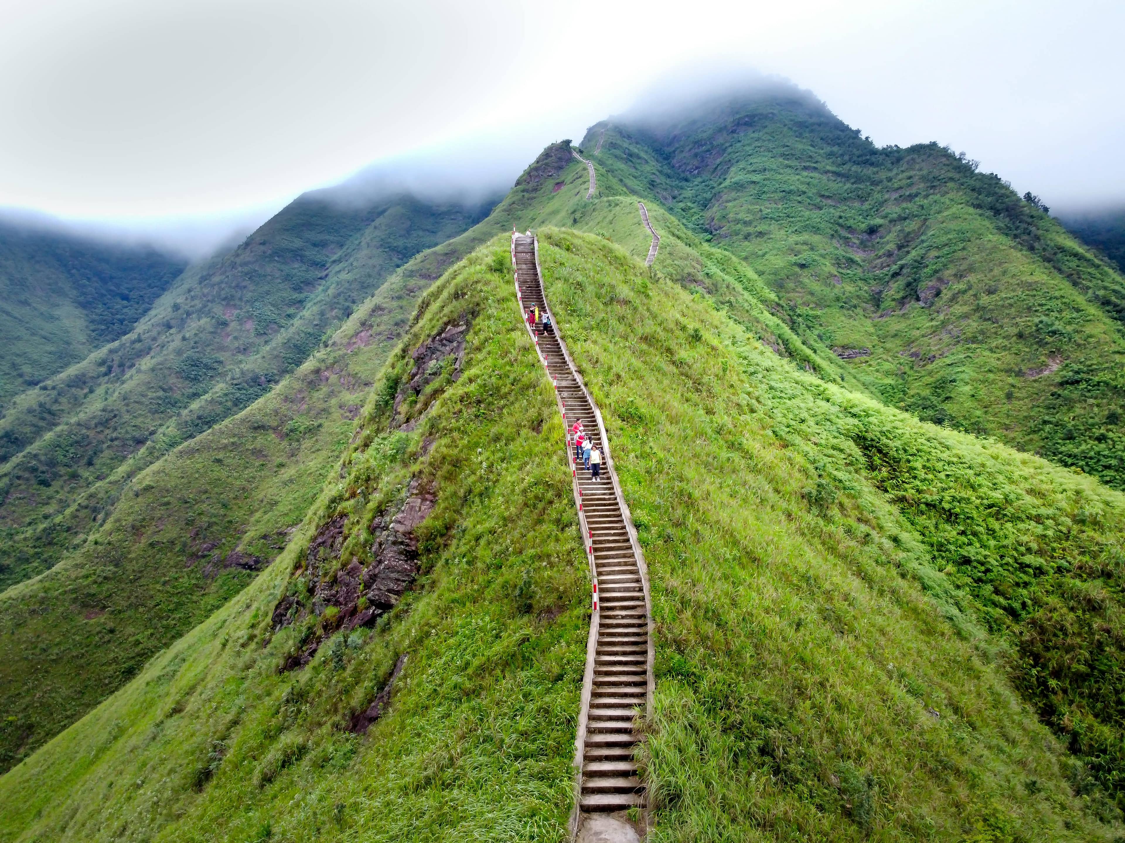background - people on steps on a mountain
